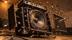 In a dim room, a speaker cabinet comes apart in mid-air, screws backing out on their own and panels drifting away. It turned itself up too far.